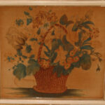 Painted fireplace screen of a basket of flowers.