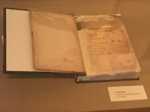 Image of Louisa Macculloch's cook book. The front cover is open to the handwritten index.