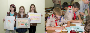 On the left, three Girl Scouts hold up drawings they created. On the right, two Boy Scouts are drawing on paper.