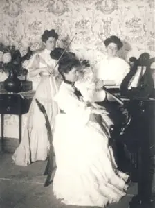 Three women playing instruments