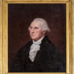 A painting of George Washington in a gold frame. A man with white hair and angular facial features looks to the left.