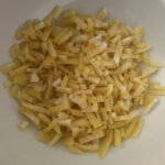 Lemon peel pieces in a bowl.