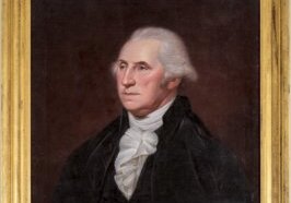 A painting of George Washington in a gold frame. A man with white hair and angular facial features looks to the left.
